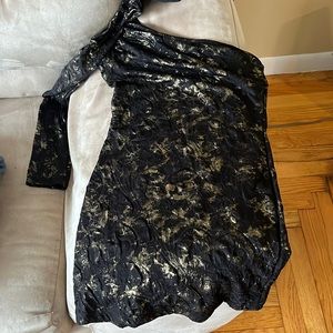 Black and gold one sleeve mini dress. Size medium
